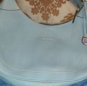 Dooney & Bourke Leather Hobo Bag. Interior of the bag has spots of makeup.